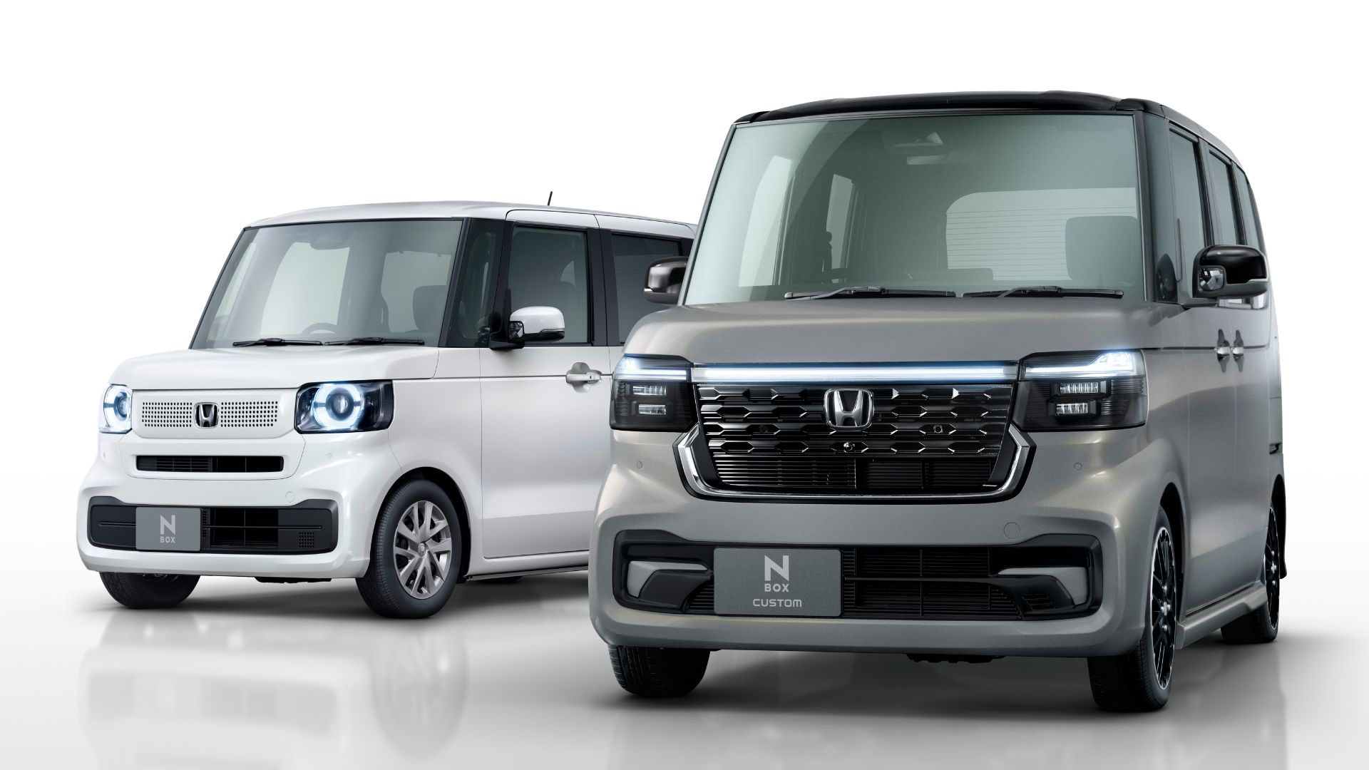 Here is the translation of the Chinese content into English while preserving the original HTML tag formatting:

- 2025 Honda N-BOX and N-BOX Custom front view comparison in Tokyo launch
- Daihatsu FunCross gold-colored car in forest camping scene
- 2025 Toyota Yaris front grill detail in Tokyo launch
- 2025 Honda N-BOX lineup showcase with sales awards in Japan
- Yellow Suzuki Spacia parked in front of bakery with people and dog
- Daihatsu Tanto light green exterior in traditional Japanese street
- Blue BYD ATTO 3 SUV in front of Mount Fuji landscape