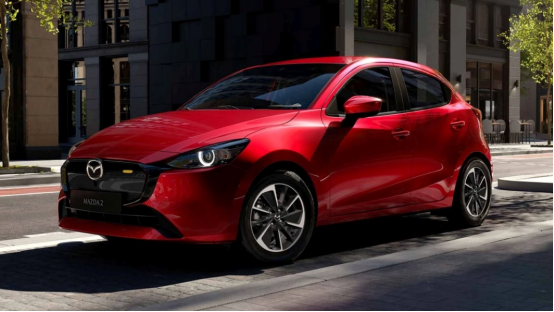 red mazda2 front grille detail in city street launch